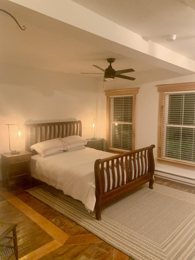 bedroom with hardwood / wood-style flooring and ceiling fan