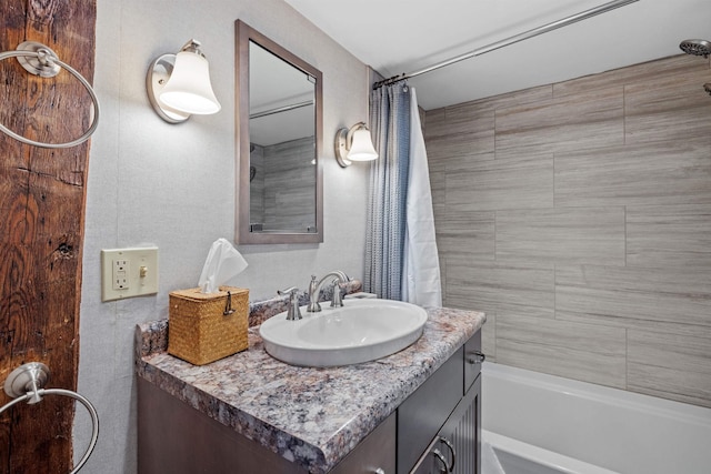 bathroom with vanity and shower / tub combo