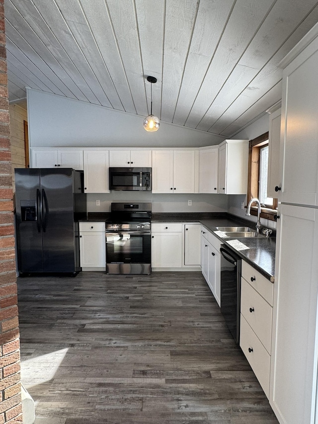 kitchen featuring pendant lighting, sink, black appliances, and white cabinets