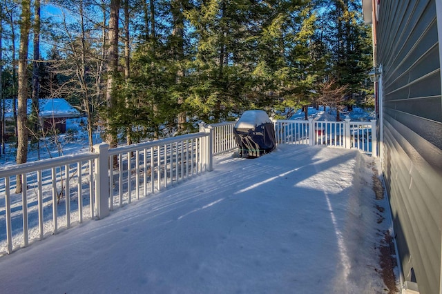 view of snow covered deck