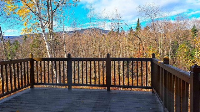 wooden terrace with a mountain view