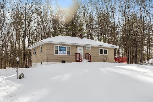 view of snow covered house