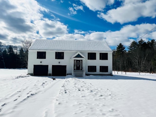 raised ranch featuring a garage