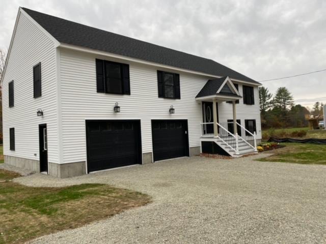 split foyer home featuring a garage