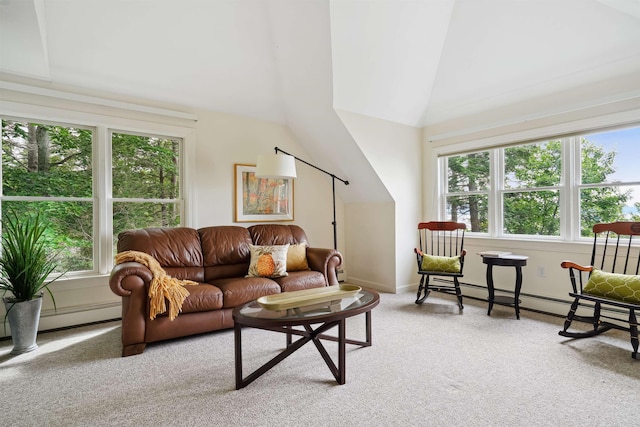 carpeted living room with lofted ceiling, a baseboard heating unit, and a wealth of natural light