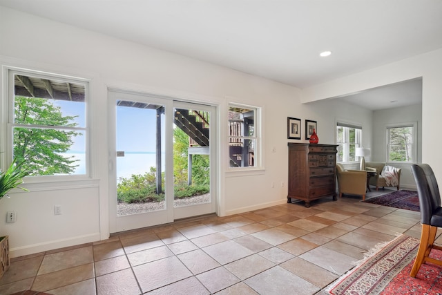 entryway featuring light tile patterned flooring