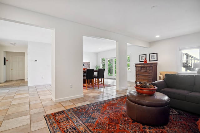 living room with light tile patterned flooring