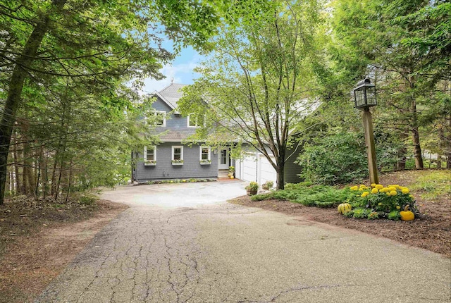 view of property hidden behind natural elements