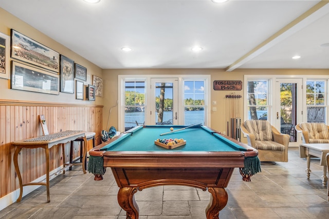 playroom featuring beamed ceiling, a water view, and pool table