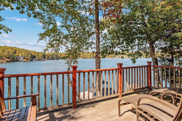 wooden terrace with a water view