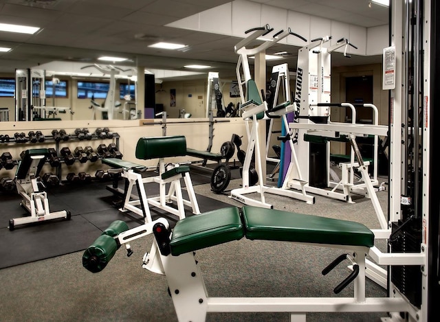 exercise room with a drop ceiling