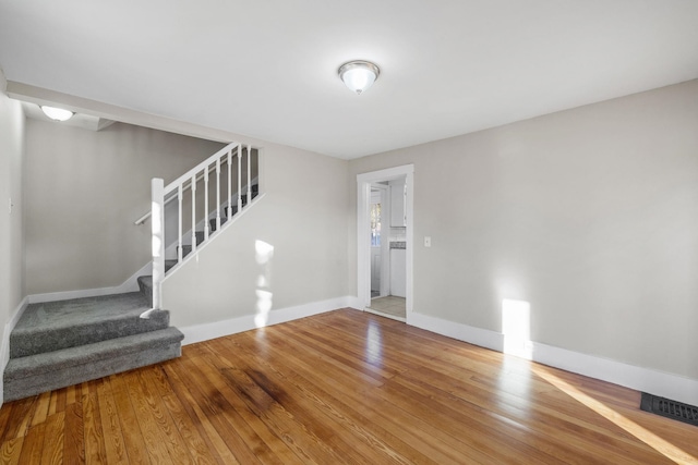 foyer with hardwood / wood-style flooring