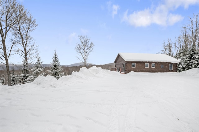 view of yard covered in snow