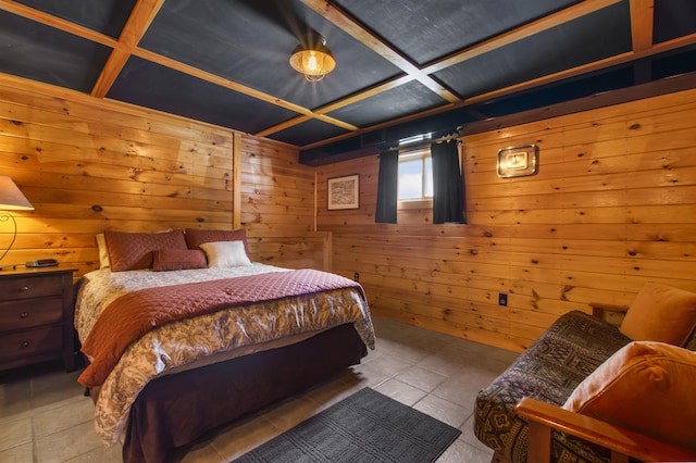 bedroom with wooden walls and coffered ceiling