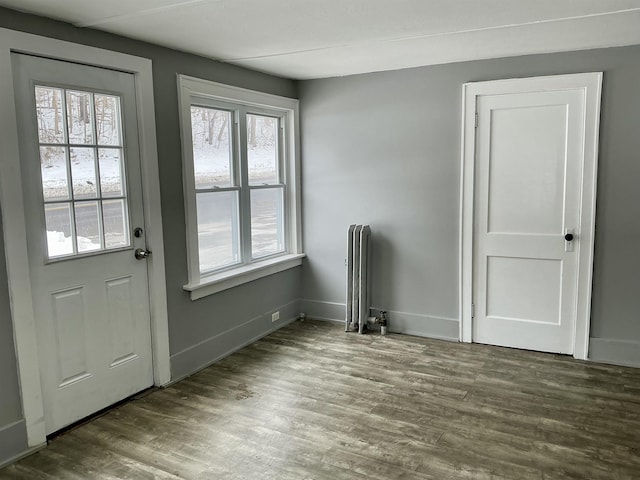 doorway to outside featuring hardwood / wood-style floors
