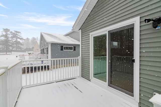 wooden balcony featuring a deck