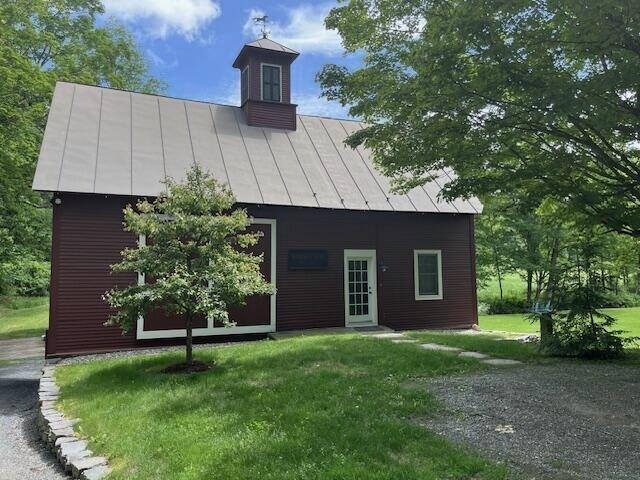 exterior space with a yard