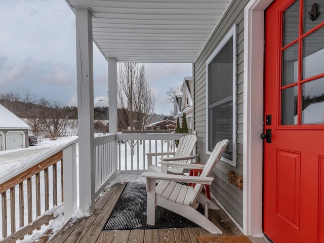 view of snow covered deck