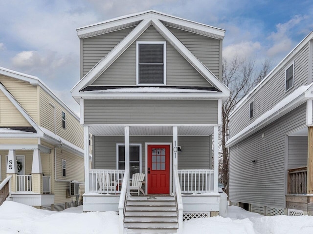 view of front of home featuring cooling unit and a porch