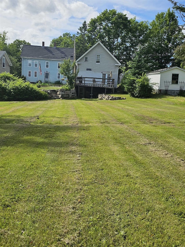 view of yard featuring a deck