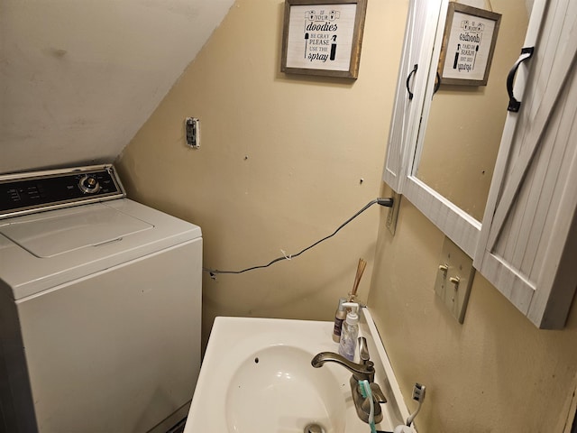 bathroom featuring washer / dryer and sink