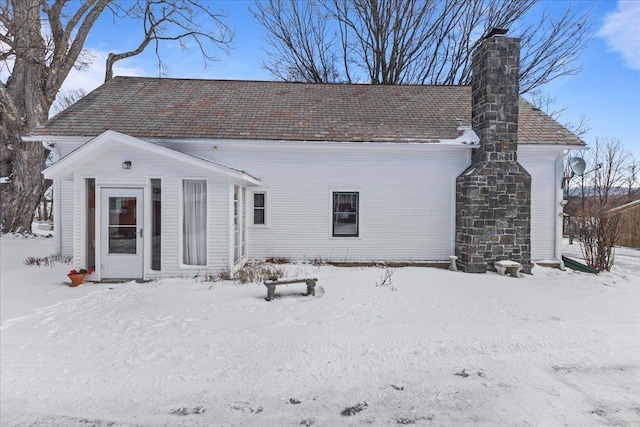 view of snow covered property