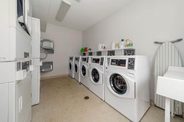 laundry room featuring stacked washer / drying machine and independent washer and dryer