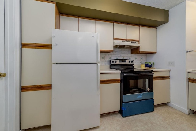 kitchen with white cabinetry, tasteful backsplash, light tile patterned floors, electric range, and white fridge