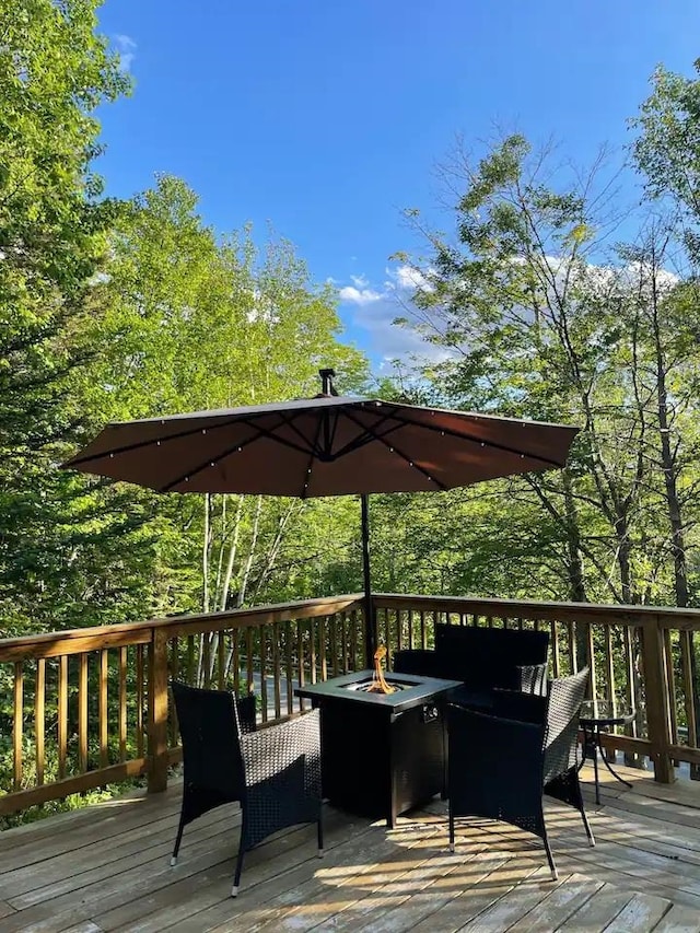 deck with an outdoor fire pit