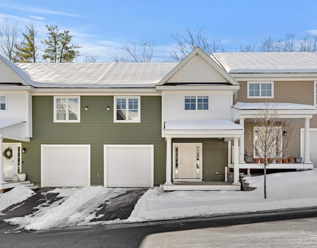 view of front of property with a garage