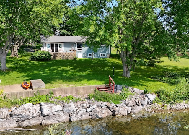 view of yard with a water view