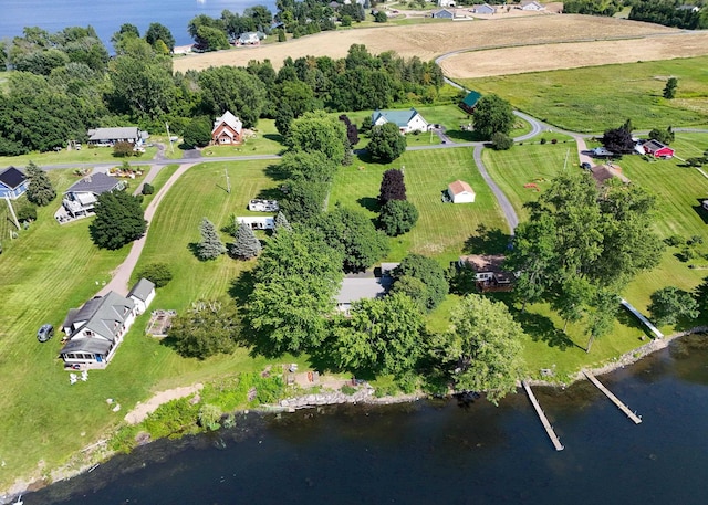 drone / aerial view featuring a rural view and a water view