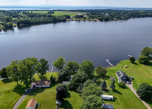 birds eye view of property featuring a water view