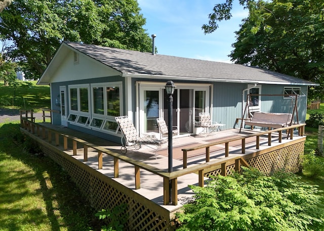 rear view of house with a deck