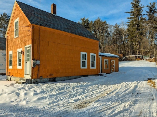 view of snow covered property