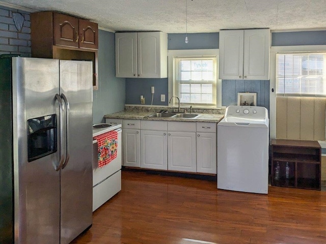 kitchen featuring sink, stainless steel fridge, washer / clothes dryer, white range with electric stovetop, and white cabinets