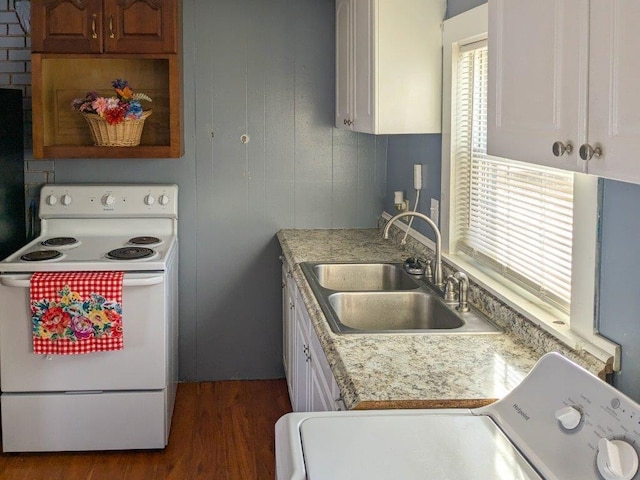 kitchen featuring dark hardwood / wood-style floors, washer / dryer, sink, white cabinets, and electric range