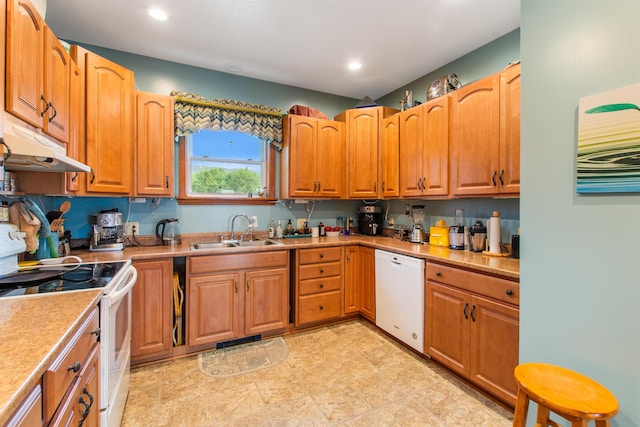 kitchen with sink and white appliances