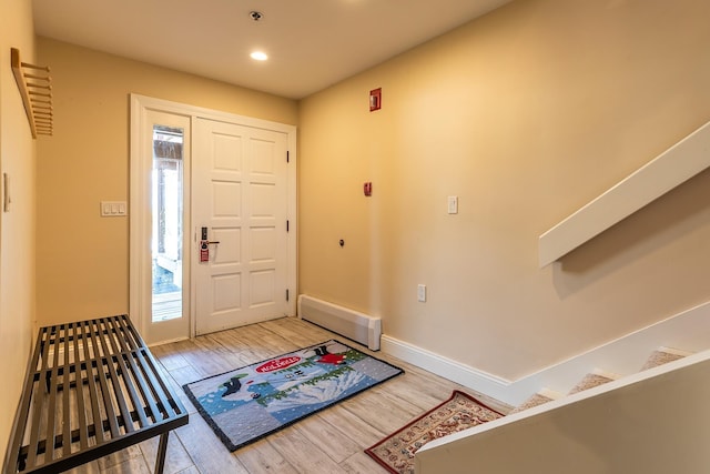 foyer entrance featuring hardwood / wood-style flooring