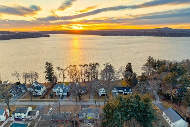 44 Winnicoash St, Laconia, NH 03246 - aerial view at dusk with a water view