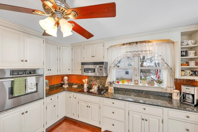 44 Winnicoash St, Laconia, NH 03246 - kitchen featuring appliances with stainless steel finishes, dark stone countertops, white cabinets, and ceiling fan