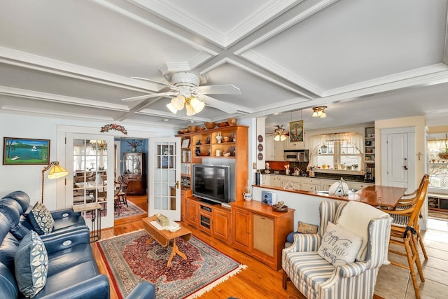 44 Winnicoash St, Laconia, NH 03246 - living room with french doors, coffered ceiling, ornamental molding, beamed ceiling, and light hardwood / wood-style floors