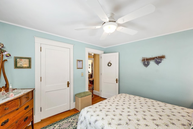 44 Winnicoash St, Laconia, NH 03246 - bedroom featuring crown molding, ceiling fan, and light hardwood / wood-style flooring