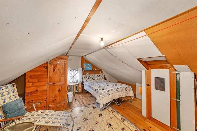 44 Winnicoash St, Laconia, NH 03246 - bedroom featuring wood-type flooring and vaulted ceiling