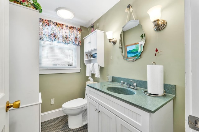 44 Winnicoash St, Laconia, NH 03246 - bathroom featuring vanity, tile patterned floors, and toilet