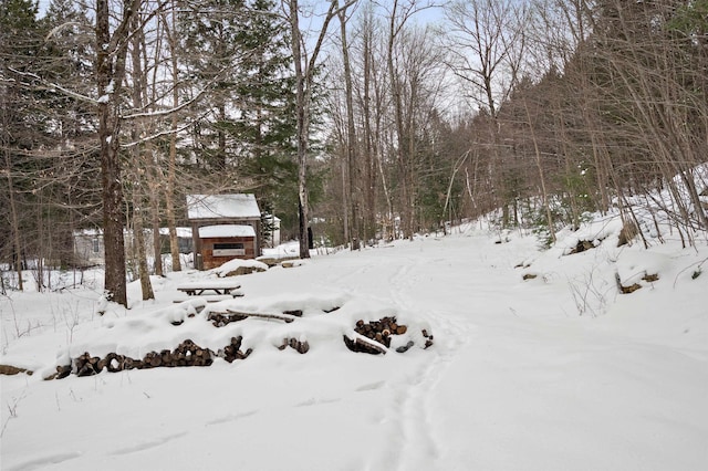 view of yard layered in snow