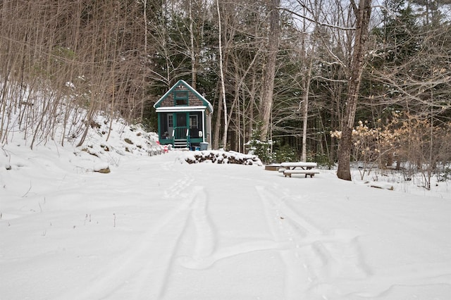 view of yard covered in snow