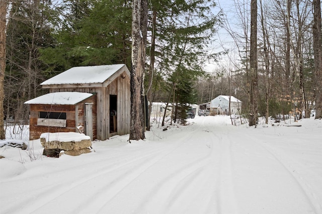 view of yard covered in snow