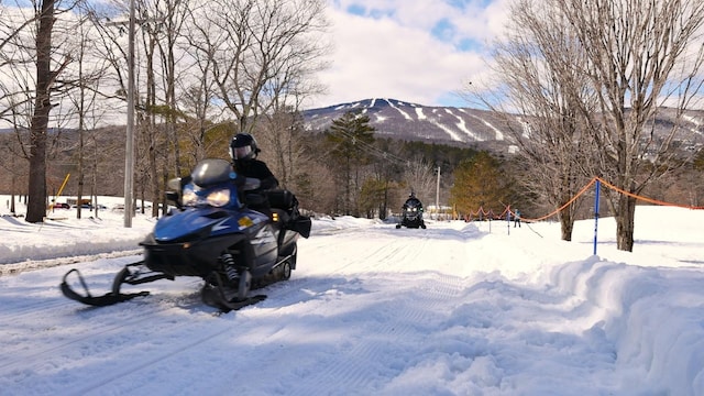 surrounding community with a mountain view