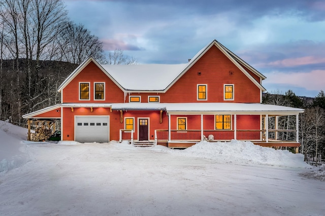 view of front facade featuring a garage and a porch